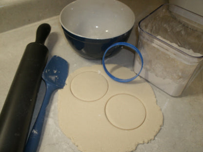 circle cookie cutter with dough cut outs